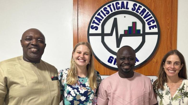 Photo of ACEIR researcher with Ghana Statistical Service colleague