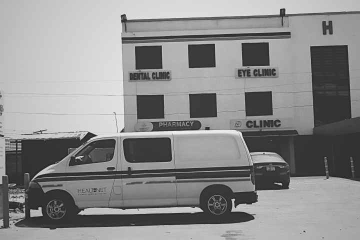 Photo of an ambulance in front of a clinic in Ghana