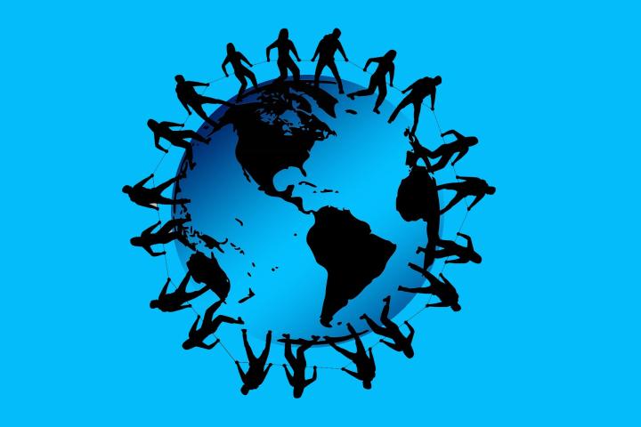 Illustration of the globe with a chain of people circling around it
