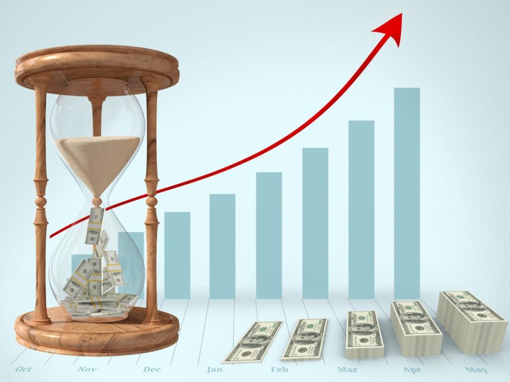 Image of hourglass and stacks of money that increase over time