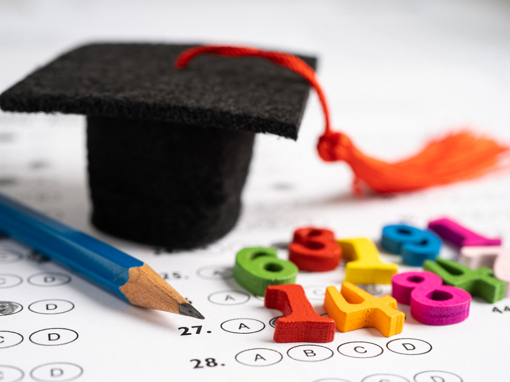 Image of education tools and graduate cap
